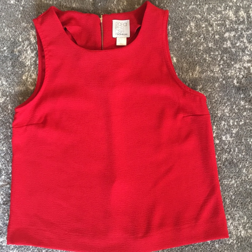 Red sleeveless blouse